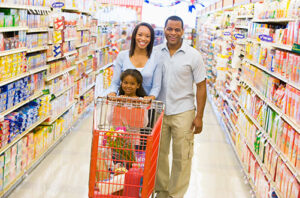 family shopping for groceries in supermarket